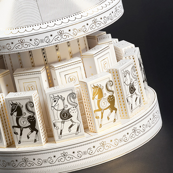 Julekalenderdesign som en karrussel