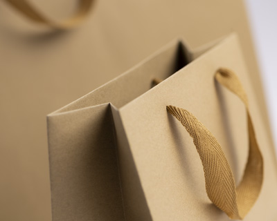 Paper bags with textile handles