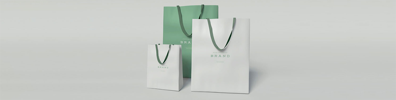 Branded paper bags green and white